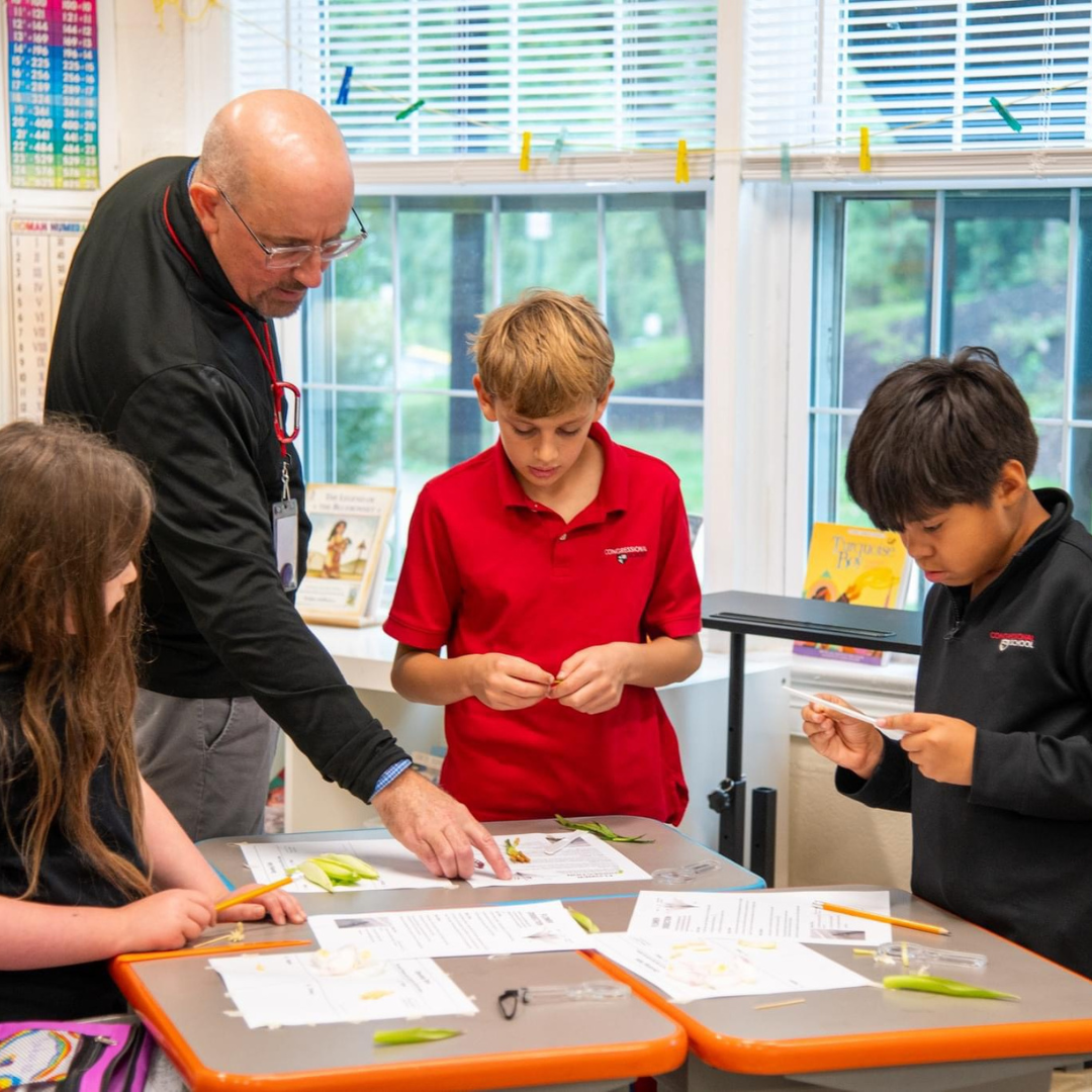 Picture of teacher and students at Congressional School